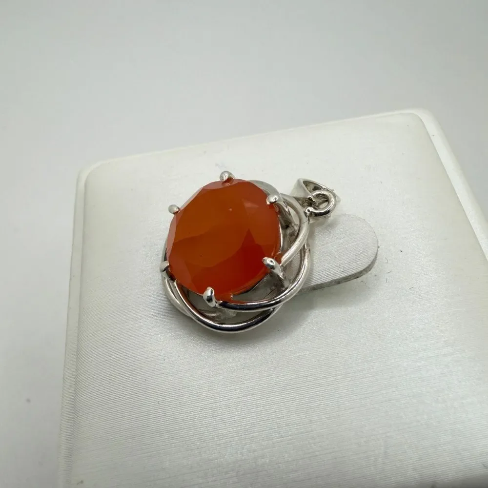 NWOT 12mm, round cut,‎ faceted Carnelian pendant in sterling silver!